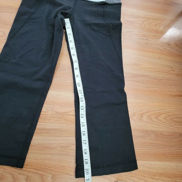 CLEARANCE!!! 💥 Lululemon Size 6 Black Slit Back Flared Yoga Capri Pants - Picture 5 of 11